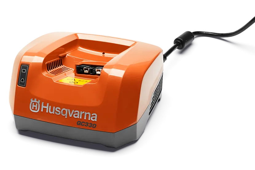 Husqvarna QC330 Chargeur fixe